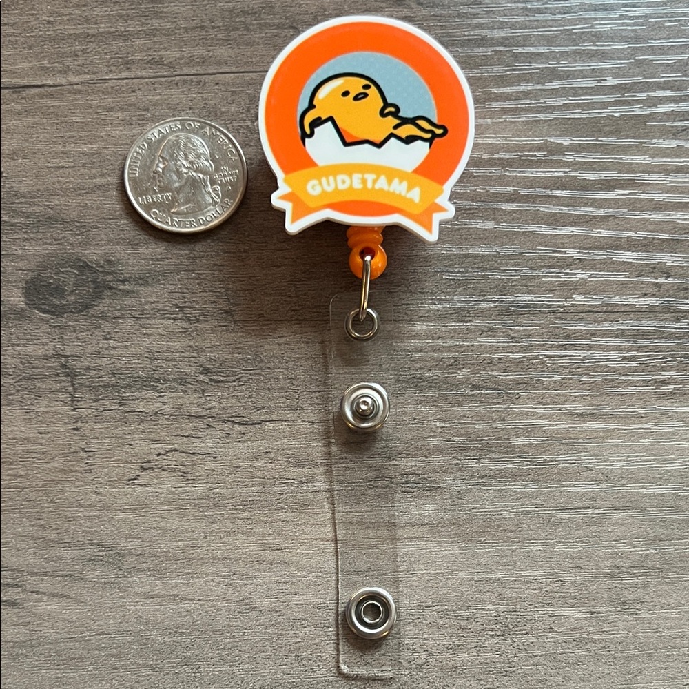 Gudetama badge reel